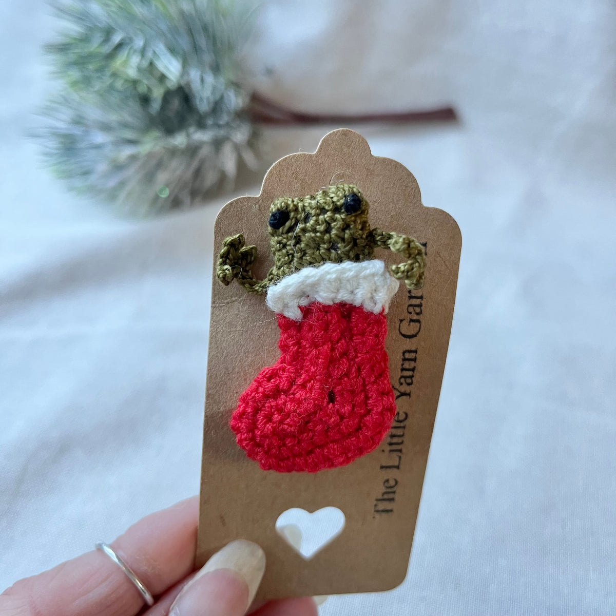 Christmas stocking frog brooch